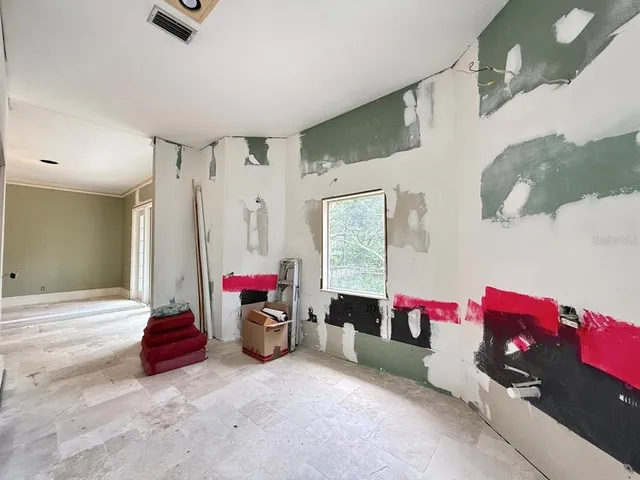 a living room with blue painted walls