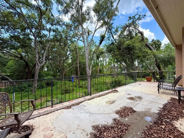 a wooden bench sitting next to a lake