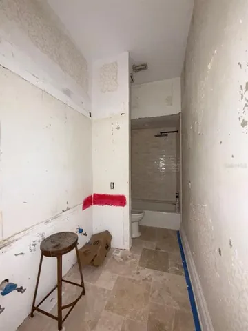 a bathroom with a sink and a shower