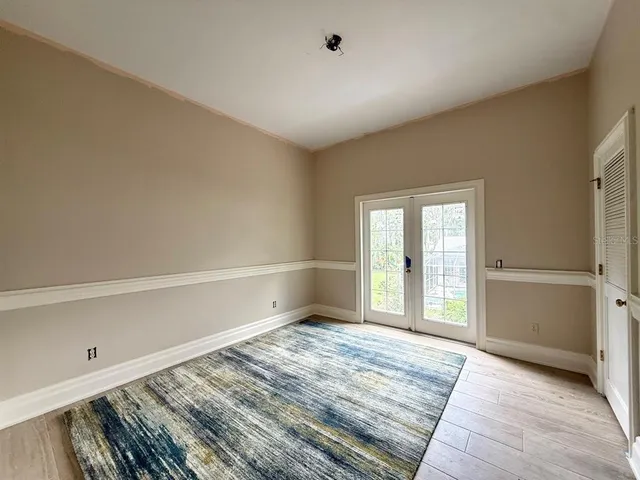 a view of an empty room and window