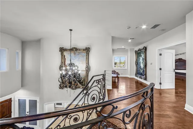 a spacious bedroom with a bed and a table