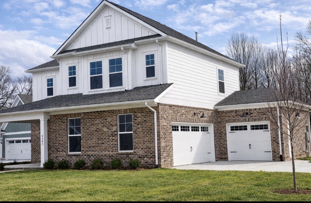 6161 Worthington Road Columbia, TN 38401 - Photo 2 of 33 a front view of a house with a garden