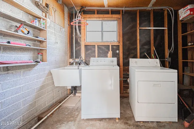 a utility room with dryer and washer