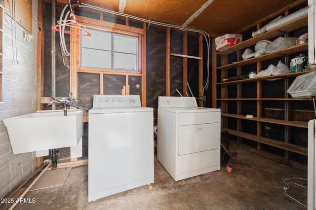 a utility room with dryer and washer