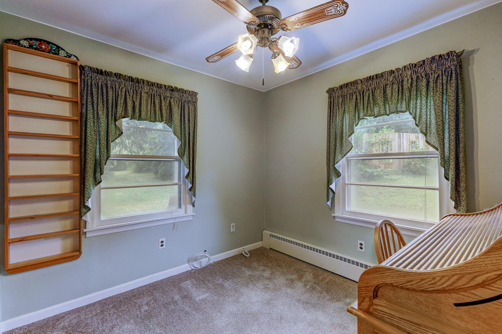 591 Riedy Road Lisle, IL 60532 - Photo 11 of 37 an empty room with windows and closet