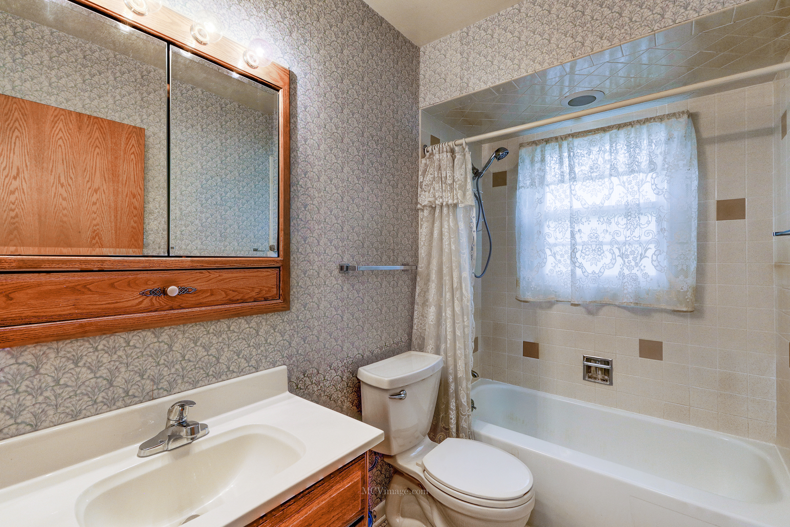 591 Riedy Road Lisle, IL 60532 - Photo 12 of 37 a bathroom with a sink toilet and shower