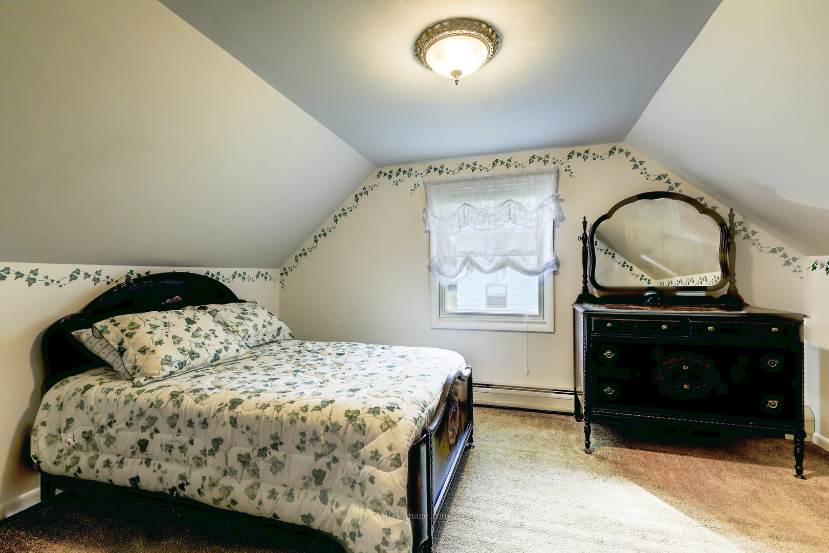 591 Riedy Road Lisle, IL 60532 - Photo 13 of 37 a bedroom with a bed and a fireplace