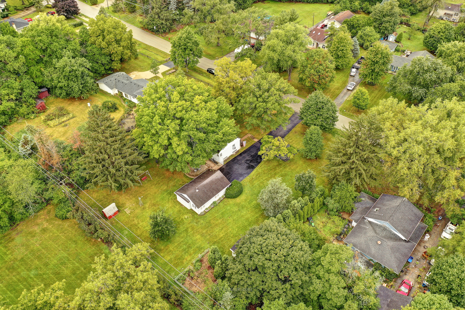 591 Riedy Road Lisle, IL 60532 - Photo 27 of 37 an aerial view of residential houses with yard