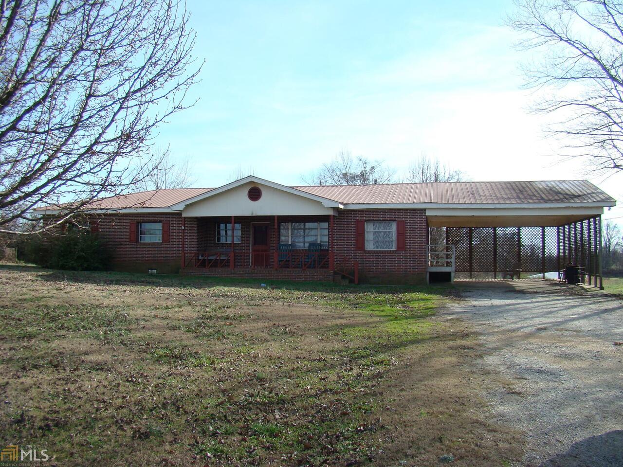 660 Rock Springs Road Lula, GA 30554 - Photo 1 of 1 a front view of a house with yard