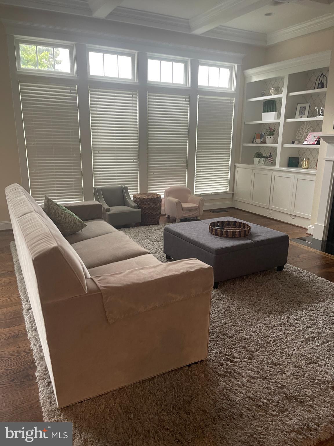 801 Meadow Lane Southwest Vienna, VA 22180 - Photo 9 of 24 a living room with furniture and a window