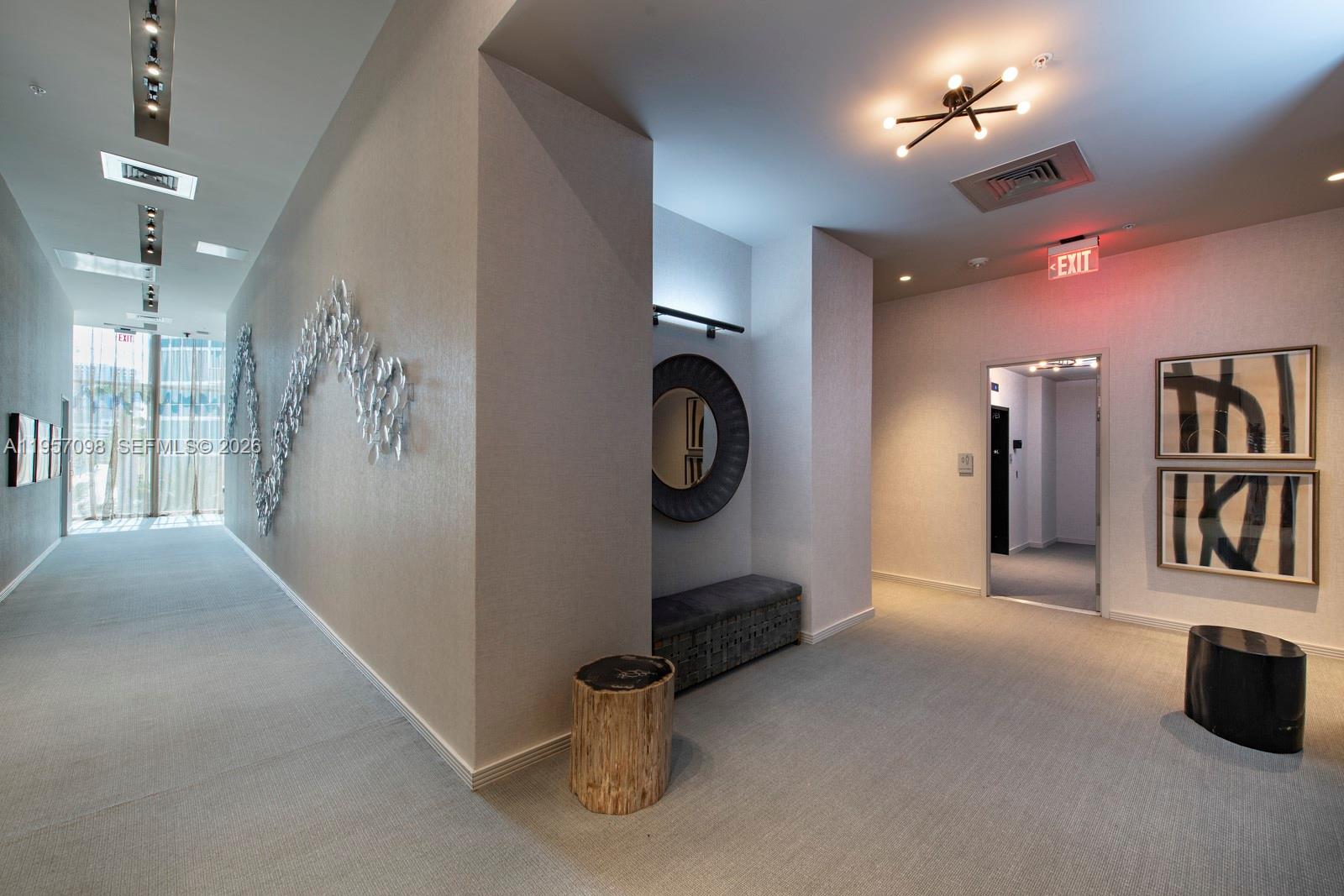 2900 Northeast 7th Avenue, Unit 3701 Miami, FL 33137 - Photo 21 of 23 a view of a hallway with windows