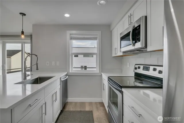 $599,000 | 3022 63rd Avenue Southwest, Unit 302, Seattle, WA 98116