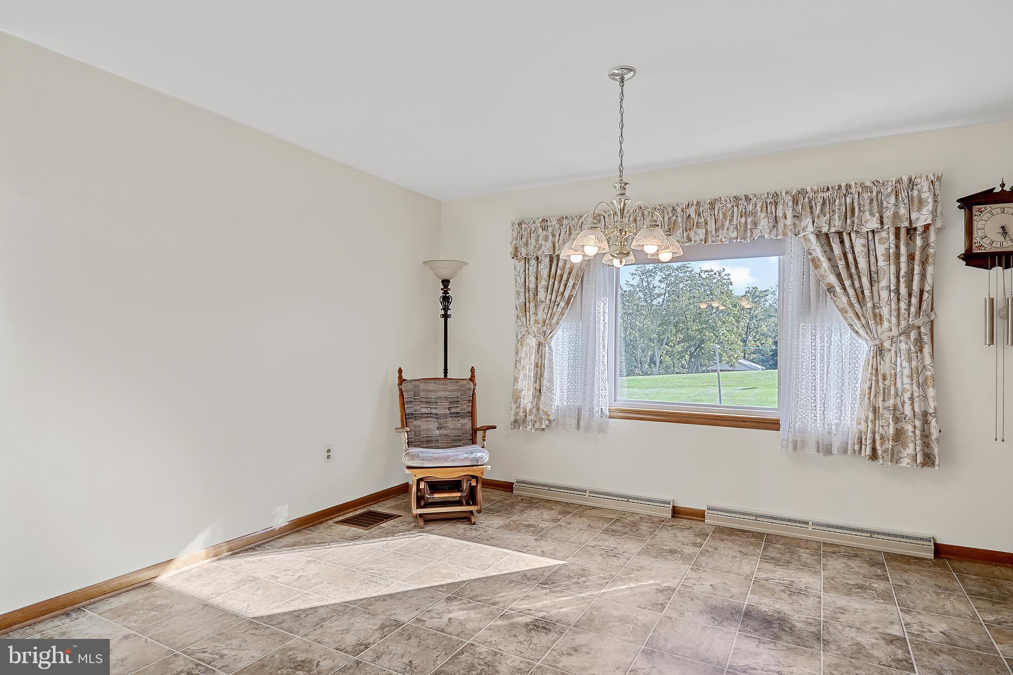 1280 Kunkle's Mill Road Wellsville, PA 17365 - Photo 12 of 40 a view of an empty room with a window