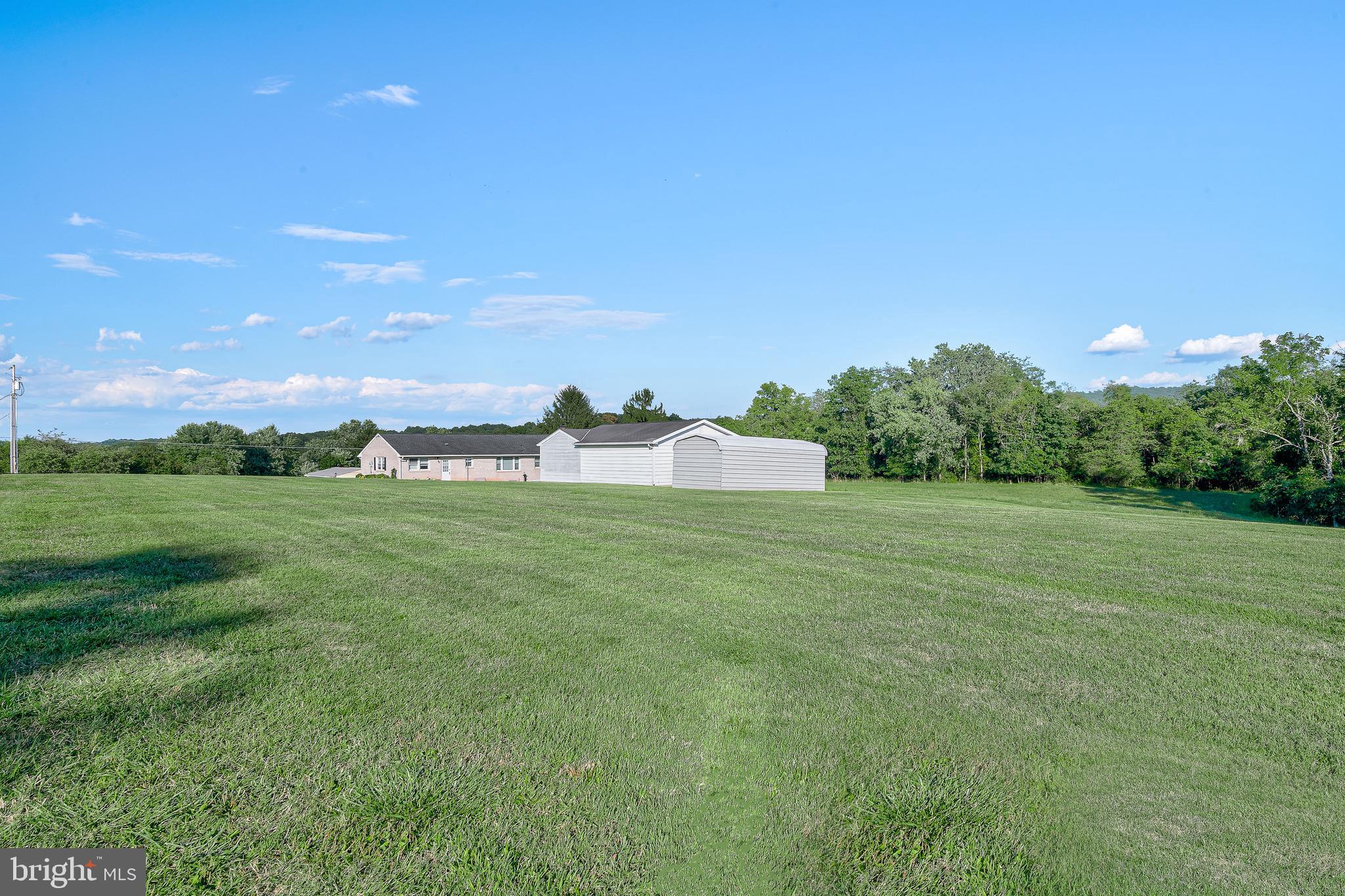 1280 Kunkle's Mill Road Wellsville, PA 17365 - Photo 34 of 40 a view of a green field with clear sky