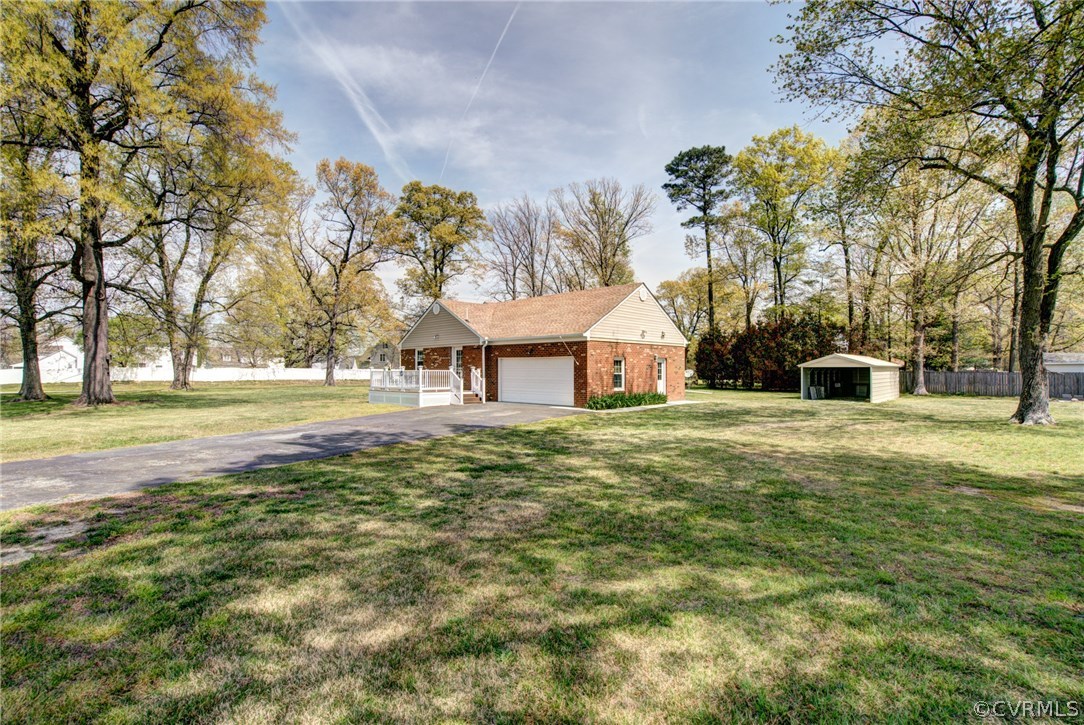 301 Meadowville Road Chester, VA 23836 - Photo 23 of 25 a view of a house with a yard