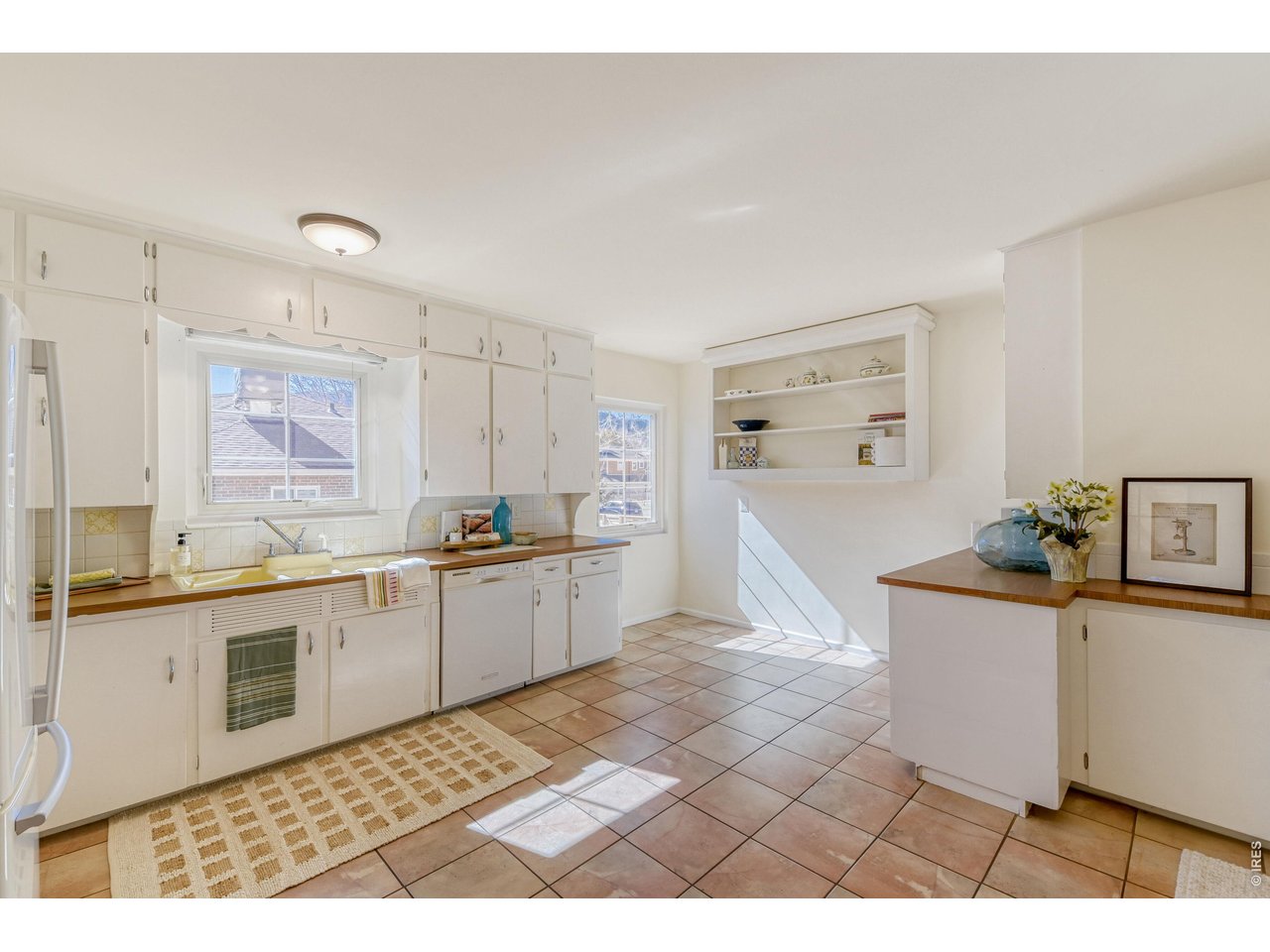 3086 11th Street Boulder, CO 80304 - Photo 9 of 28 Large spacious kitchen with loads of storage and natural light