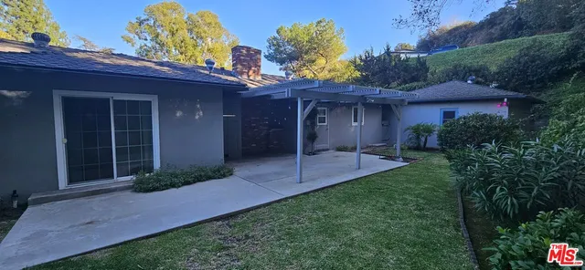 a view of a porch with a yard