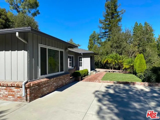a view of backyard of house