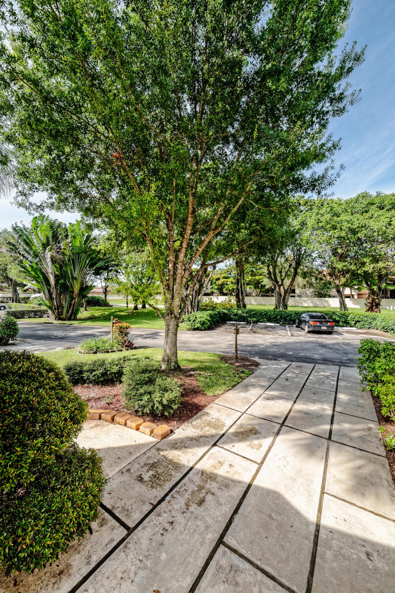 6595 Parkview Drive, Unit F Boca Raton, FL 33433 - Photo 23 of 28 driveway from garage RTW_5467_DxO