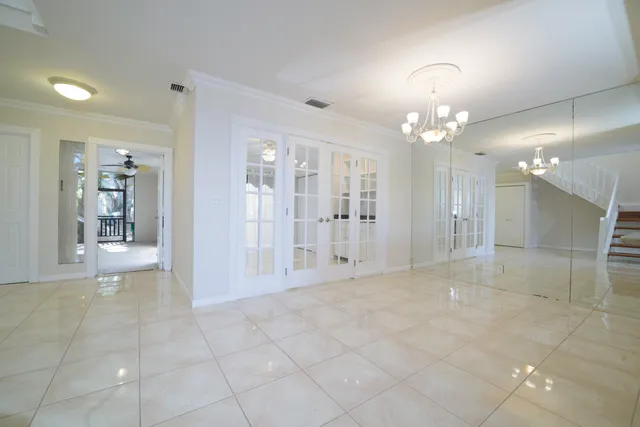 a bathroom with a toilet and bathtub