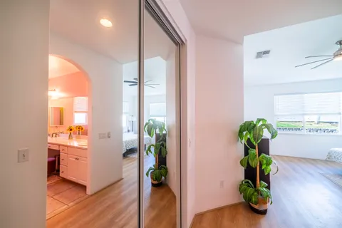 a view of hall with wooden floor