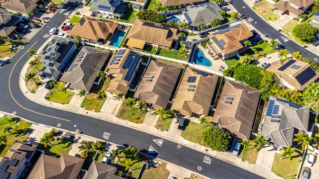 a view of a swimming pool with a table and chairs