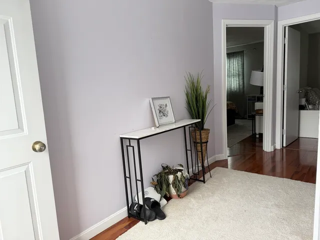 a view of a hallway with workspace