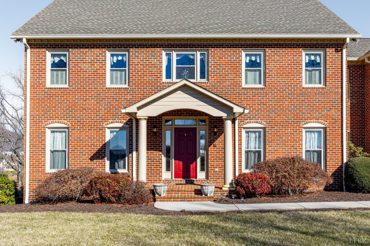 3755 Perrowville Road Forest, VA 24551 - Photo 2 of 60 front view of brick house with a yard