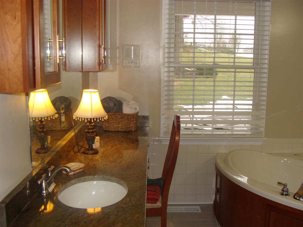 3040 Arrowhead Road Harrisonburg, VA 22801 - Photo 35 of 50 The master bath includes separated his and hers sinks, corner whirlpool tub and shower. The flooring is ceramic tile