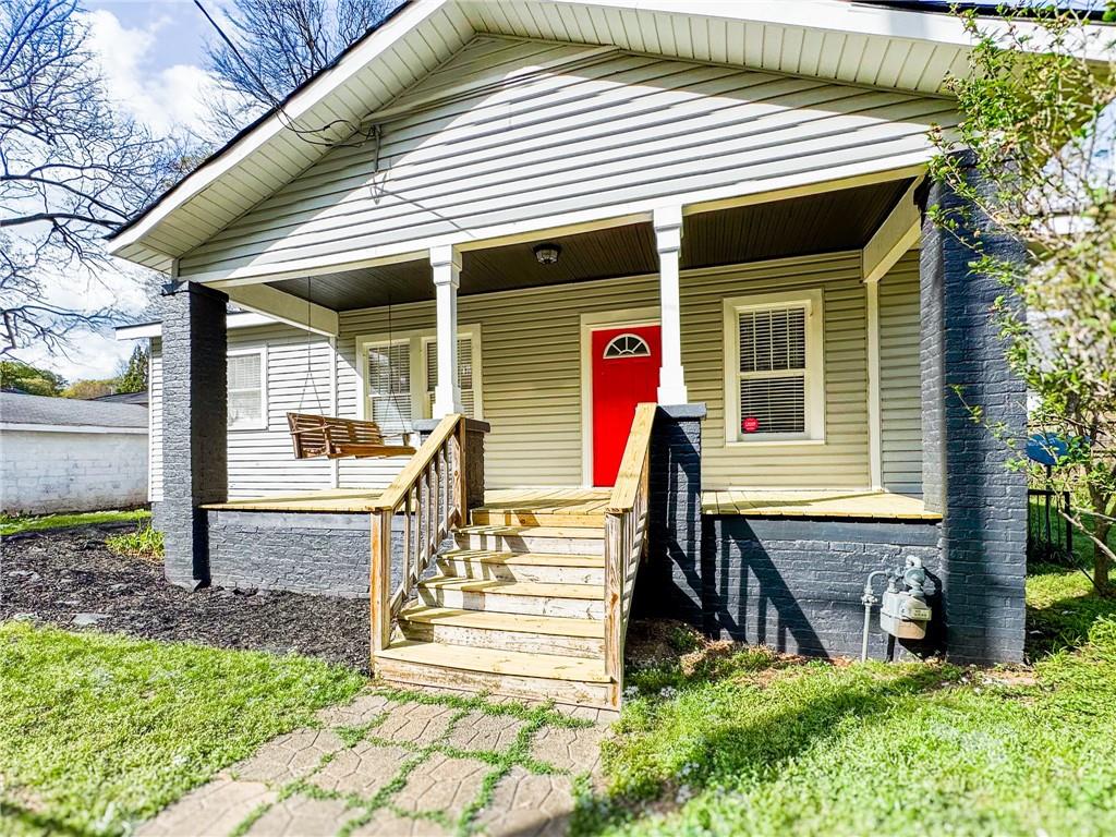 a front view of house with street