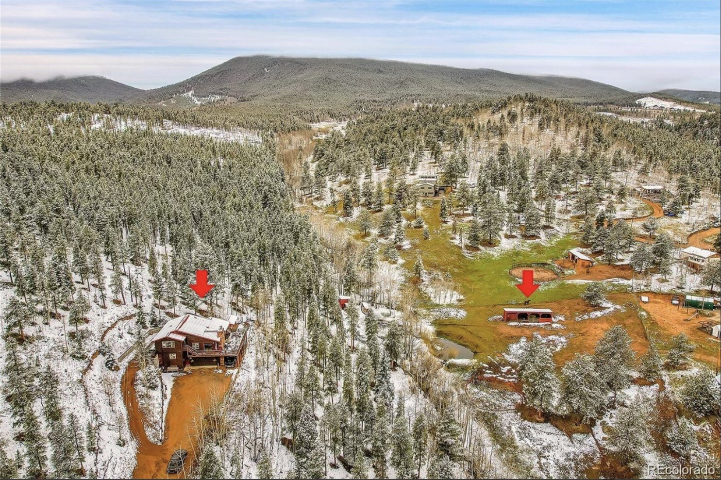 637 Rock Road Bailey, CO 80421 - Photo 30 of 50 The creek and the pond are positioned between the house and the large loafing shed.