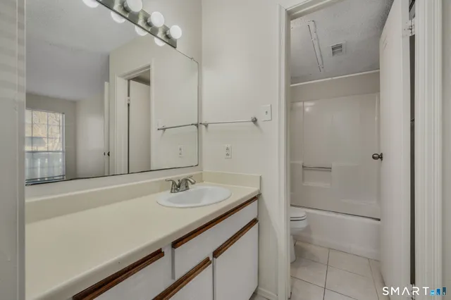 a view of a town with barn house