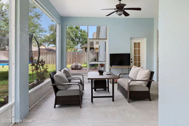 a view of a swimming pool with a patio
