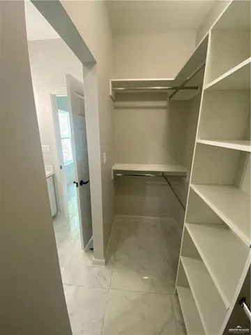 a view of a backyard with pathway