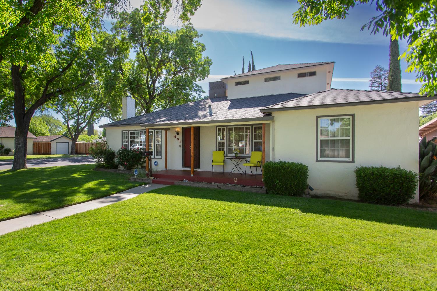 401 Fortuna Avenue Modesto, CA 95354 - Photo 3 of 43 front view of a house with a yard