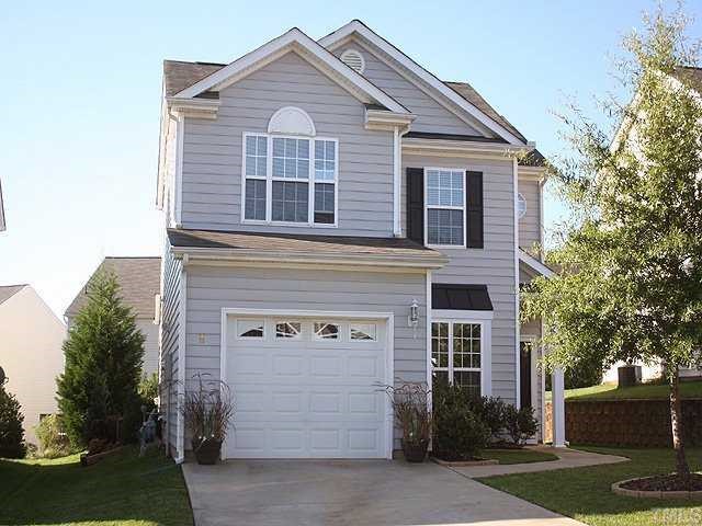 8333 Tie Stone Way Raleigh, NC 27613 - Photo 1 of 12 a view of a house with a yard