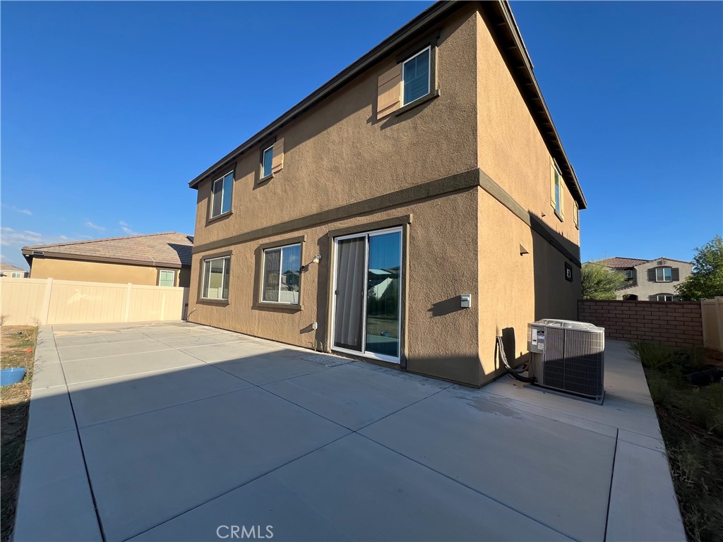 29837 Warrior Way Menifee, CA 92584 - Photo 18 of 18 a front view of a house with a garage