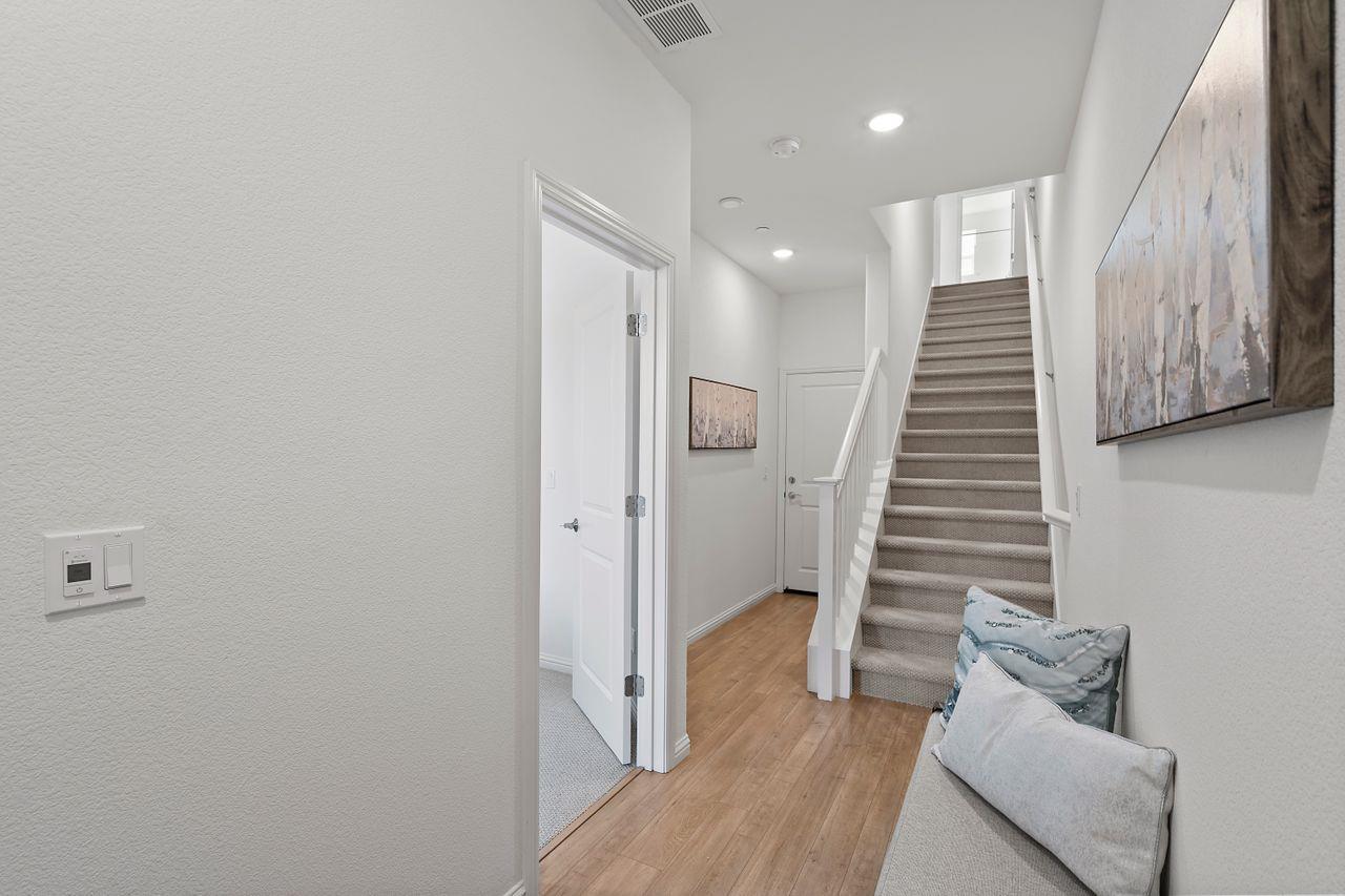 718 Fruit Ranch Loop San Jose, CA 95133 - Photo 14 of 36 a view of entryway with furniture and wooden floor