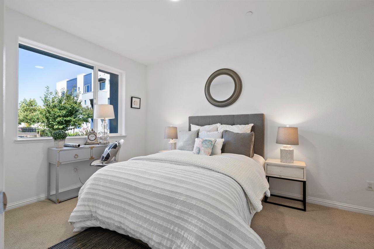 718 Fruit Ranch Loop San Jose, CA 95133 - Photo 17 of 36 a bedroom with a bed and a window