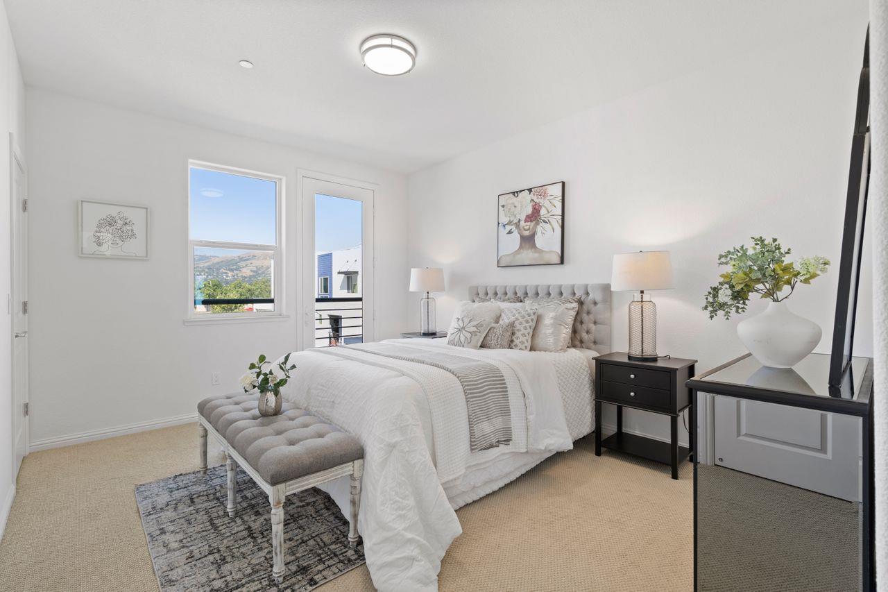 718 Fruit Ranch Loop San Jose, CA 95133 - Photo 21 of 36 a bedroom with a bed and furniture