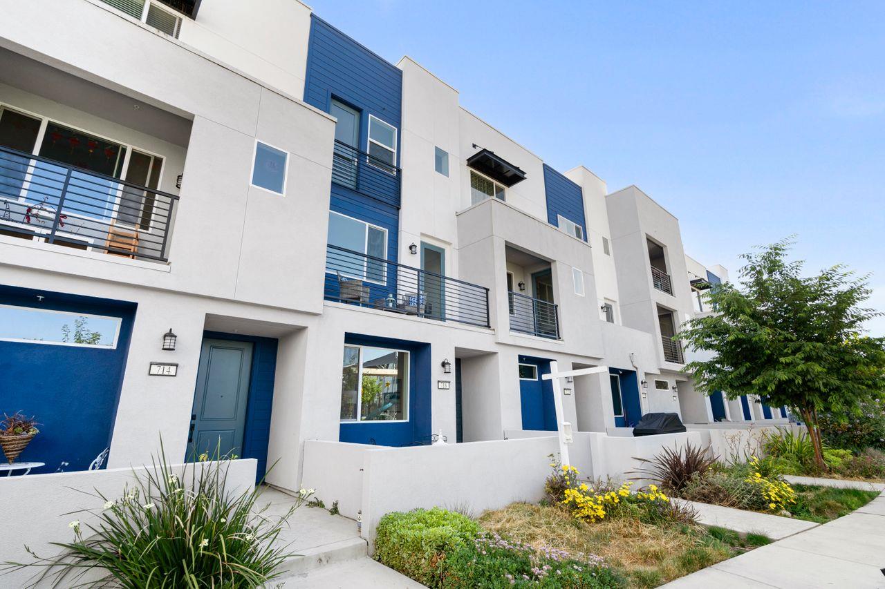 718 Fruit Ranch Loop San Jose, CA 95133 - Photo 3 of 36 a front view of a multi story building