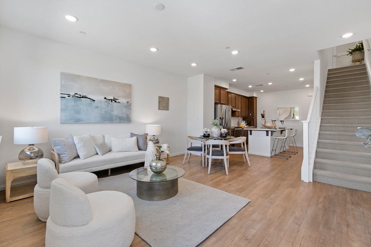 718 Fruit Ranch Loop San Jose, CA 95133 - Photo 8 of 36 a living room with furniture and wooden floor