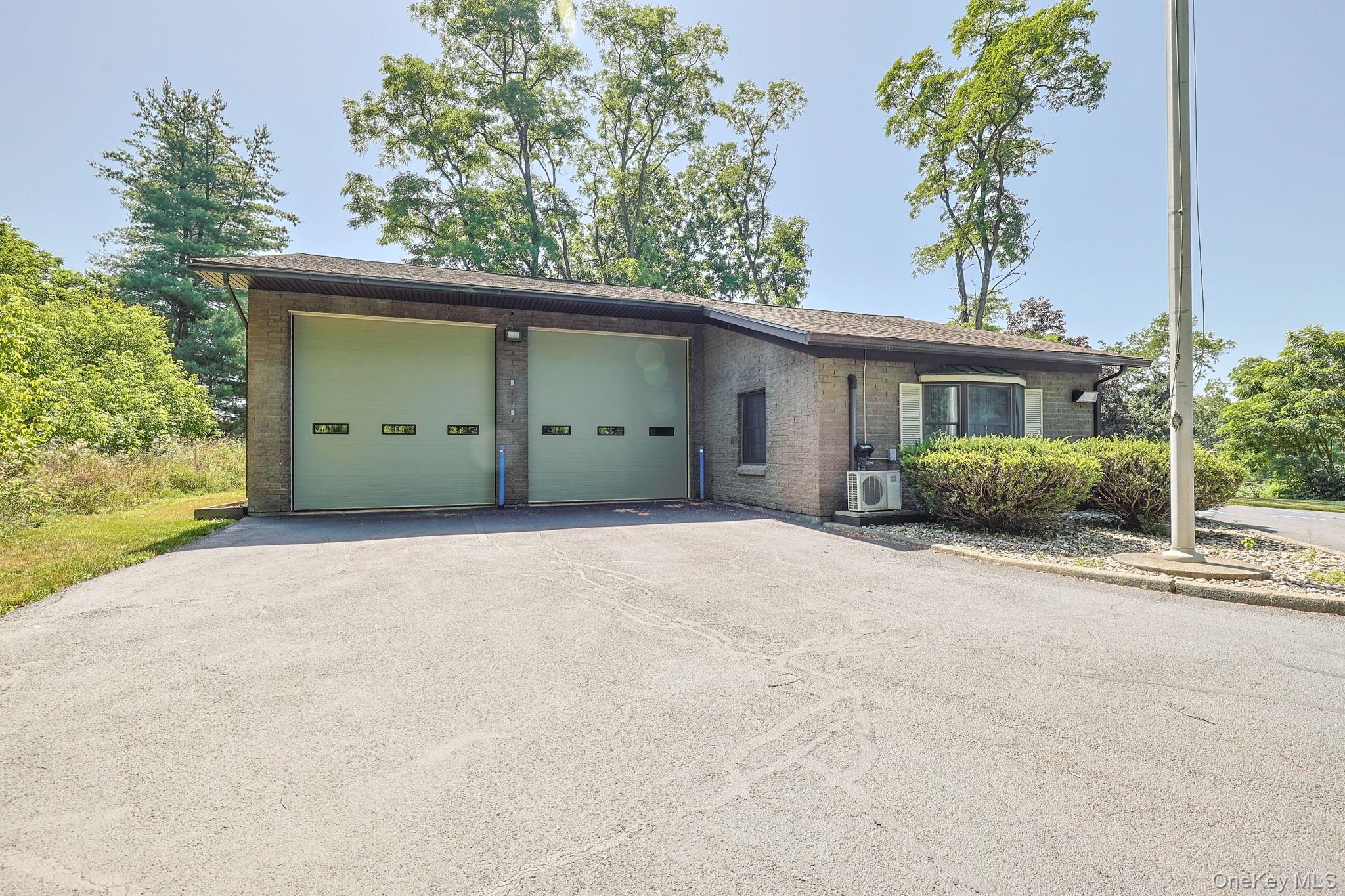 501 Cedar Hill Road Fishkill, NY 12524 - Photo 3 of 19 a view of a house with a yard and garage