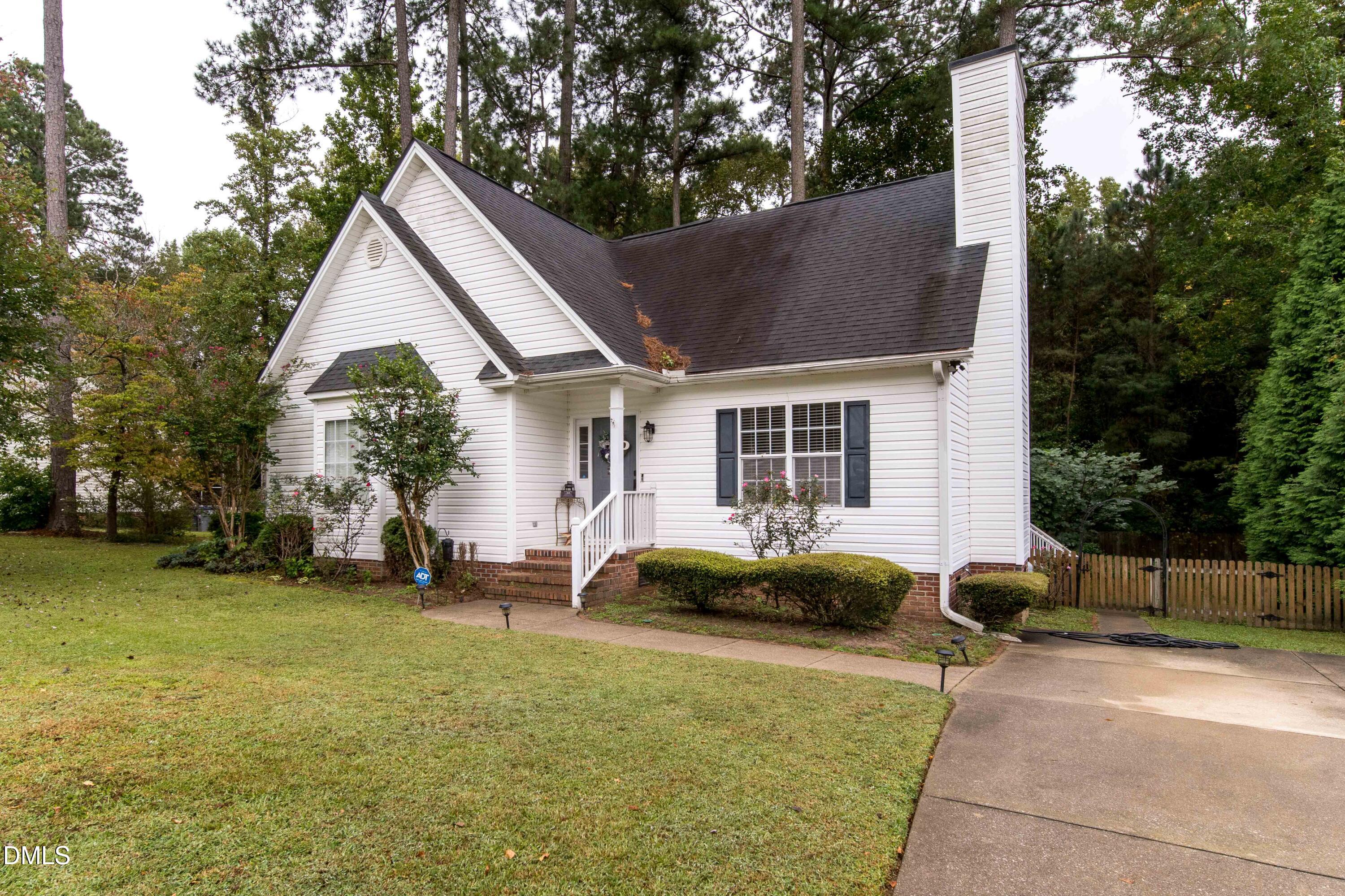 4411 Lessie Trail Rocky Mount, NC 27804 - Photo 2 of 27 a house view with a sitting space and garden space