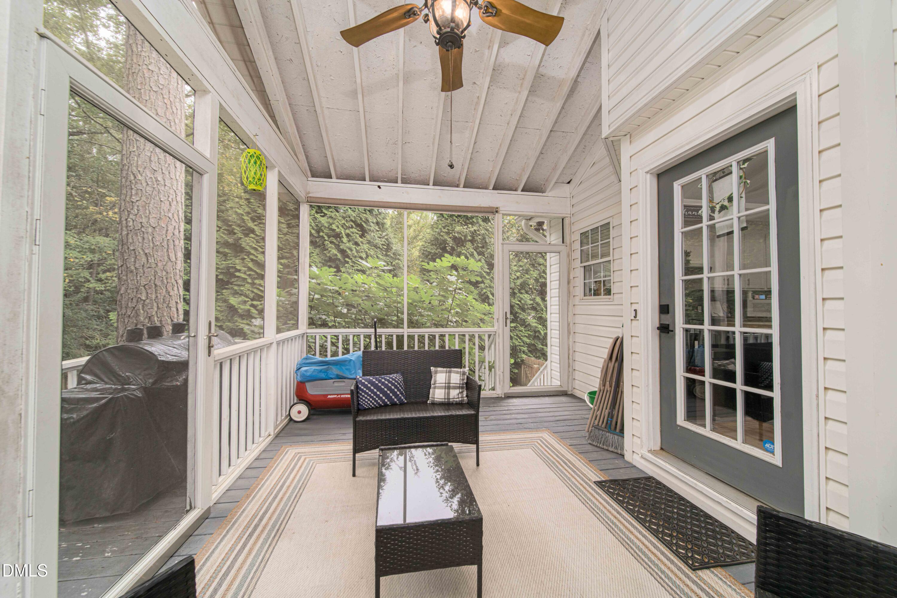 4411 Lessie Trail Rocky Mount, NC 27804 - Photo 24 of 27 a balcony with furniture and large windows