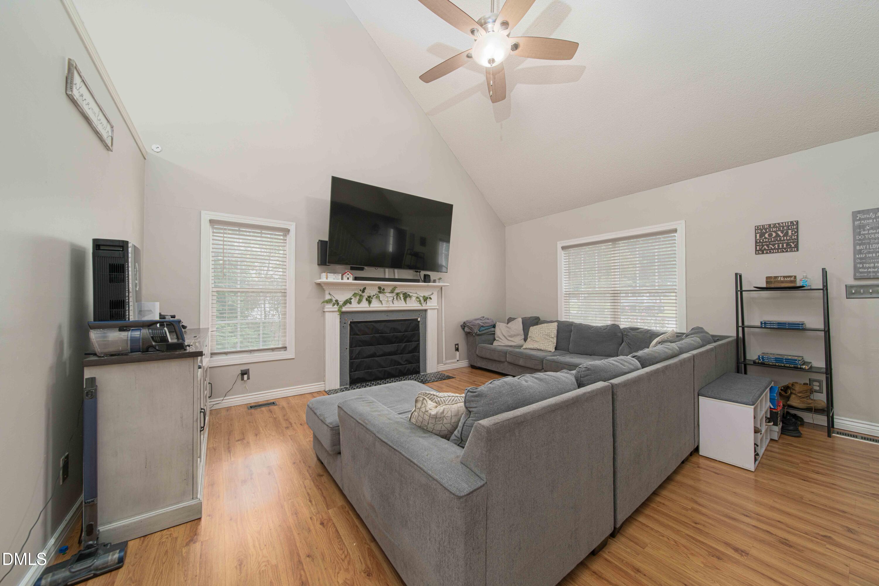 4411 Lessie Trail Rocky Mount, NC 27804 - Photo 5 of 27 a living room with furniture and a flat screen tv