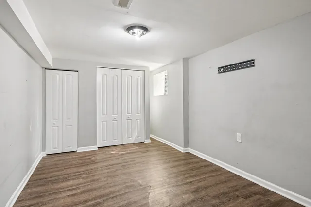 a view of entryway with wooden floor