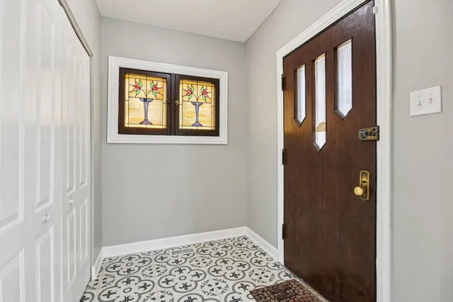 a view of hallway with a window