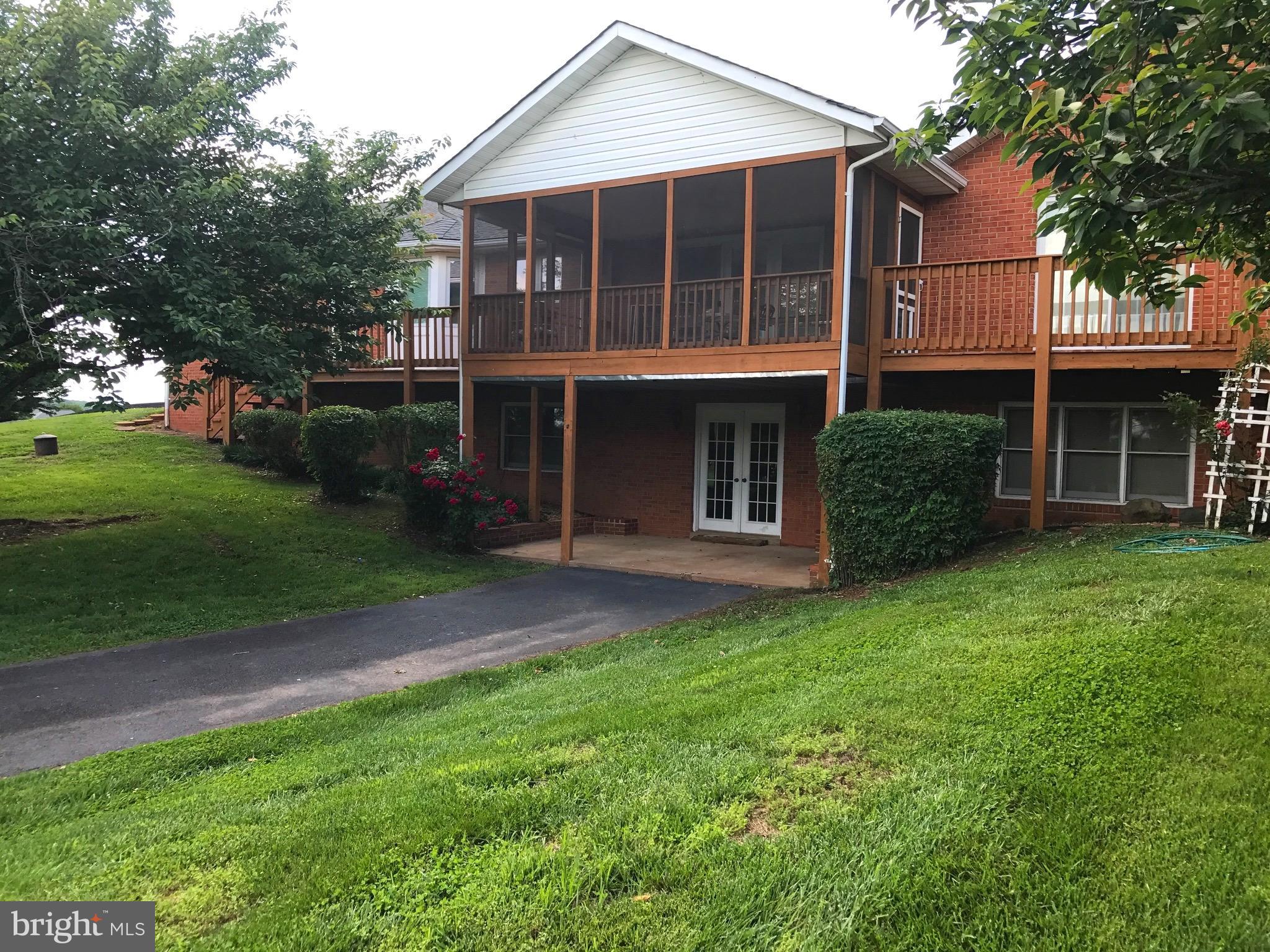 19321 Old Orange Road Culpeper, VA 22701 - Photo 2 of 28 Screened porch and lower level walkout