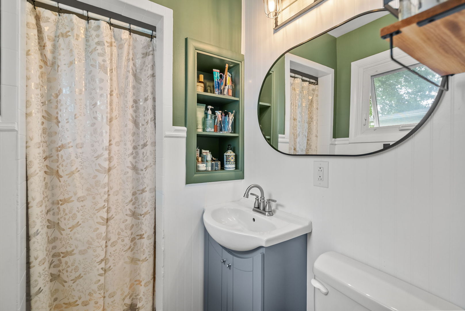 1435 26th Avenue Moline, IL 61265 - Photo 14 of 38 a bathroom with a sink and a mirror